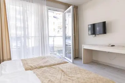 Łóżko lub łóżka w pokoju w obiekcie VacationClub - Solden Apartament 18