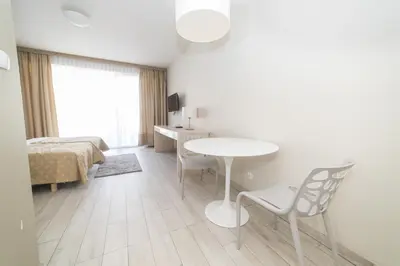 Łóżko lub łóżka w pokoju w obiekcie VacationClub - Solden Apartament 18