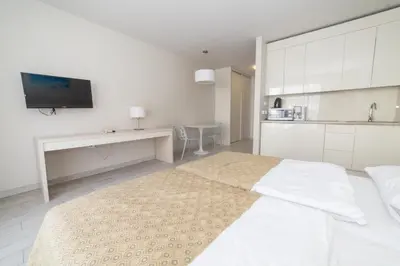 Łóżko lub łóżka w pokoju w obiekcie VacationClub - Solden Apartament 18