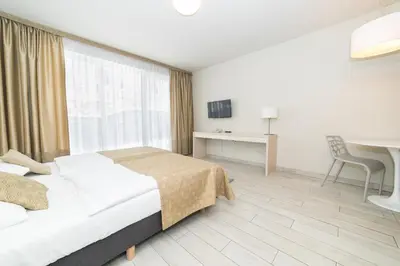 Łóżko lub łóżka w pokoju w obiekcie VacationClub - Solden Apartament 29