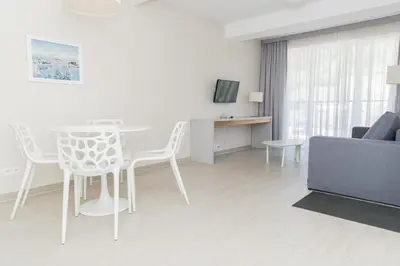 Telewizja i/lub zestaw kina domowego w obiekcie VacationClub - Stubai Apartament 16
