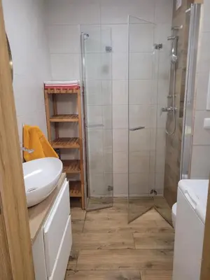 Łazienka w obiekcie Apartament przy Rynku z garażem
