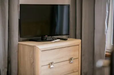 Telewizja i/lub zestaw kina domowego w obiekcie VacationClub - Bystrzycka Apartament 2