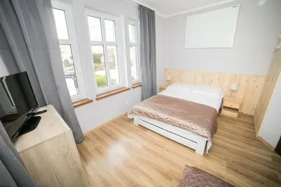 Łóżko lub łóżka w pokoju w obiekcie VacationClub - Bystrzycka Apartament 2