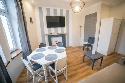 Telewizja i/lub zestaw kina domowego w obiekcie VacationClub - Bystrzycka Apartament 2