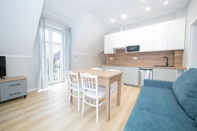 Telewizja i/lub zestaw kina domowego w obiekcie VacationClub - Zdrojowa 7 Apartament 7