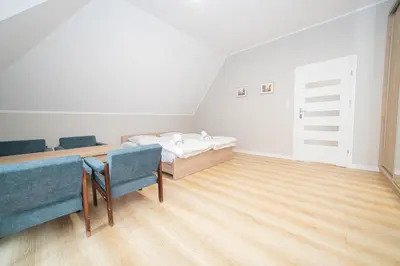 Łóżko lub łóżka w pokoju w obiekcie VacationClub – Zdrojowa 7 Apartament 8