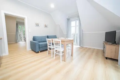 Telewizja i/lub zestaw kina domowego w obiekcie VacationClub – Zdrojowa 7 Apartament 11
