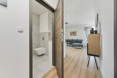 Część wypoczynkowa w obiekcie Spacious Apartment with Balcony near the Slavic Hill Wrocław by Renters Prestige