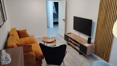 Telewizja i/lub zestaw kina domowego w obiekcie APARTAMENT 