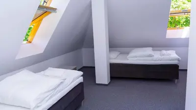 Łóżko lub łóżka w pokoju w obiekcie Bon Żur