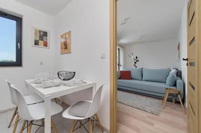 Część wypoczynkowa w obiekcie City Center Mirrors Apartment with Parking by Noclegi Renters