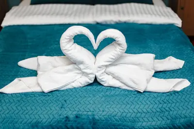 Łóżko lub łóżka w pokoju w obiekcie Cozy Apartment