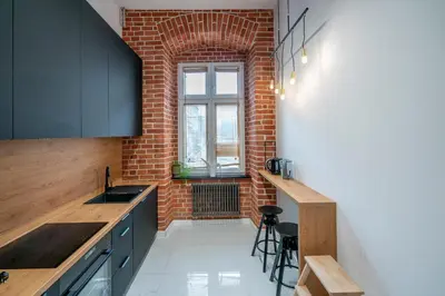 Kuchnia lub aneks kuchenny w obiekcie Komfortowy loft w centrum ~ Self Check-In 24h