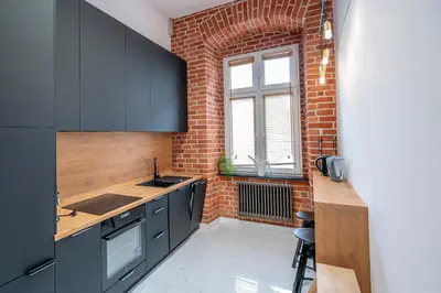 Kuchnia lub aneks kuchenny w obiekcie Komfortowy loft w centrum ~ Self Check-In 24h