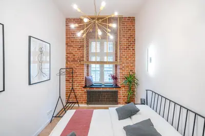 Łóżko lub łóżka w pokoju w obiekcie Komfortowy loft w centrum ~ Self Check-In 24h