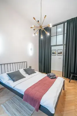 Łóżko lub łóżka w pokoju w obiekcie Komfortowy loft w centrum ~ Self Check-In 24h