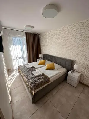 Łóżko lub łóżka w pokoju w obiekcie Comfy Apartment Kłodzko - KLIMATYZACJA