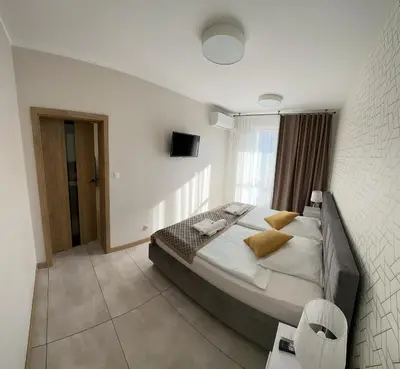 Łóżko lub łóżka w pokoju w obiekcie Comfy Apartment Kłodzko - KLIMATYZACJA