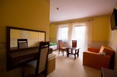 Telewizja i/lub zestaw kina domowego w obiekcie Gościniec Willa Sandra