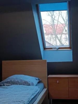Łóżko lub łóżka w pokoju w obiekcie Chata Opata
