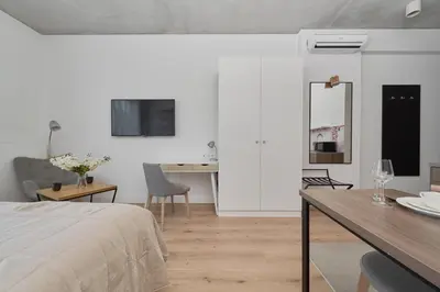 Telewizja i/lub zestaw kina domowego w obiekcie PIEKARNIA Żywa Kultura Atmospheric Apartments in Wrocław by Noclegi Renters
