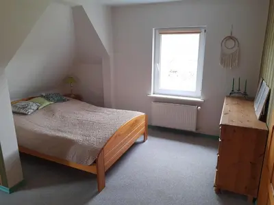 Łóżko lub łóżka w pokoju w obiekcie DOM W SUDETACH