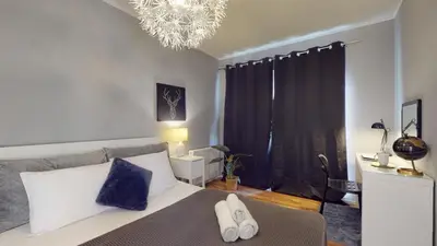Łóżko lub łóżka w pokoju w obiekcie Kurkowa 14 Tectum Apartments