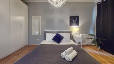 Łóżko lub łóżka w pokoju w obiekcie Kurkowa 14 Tectum Apartments