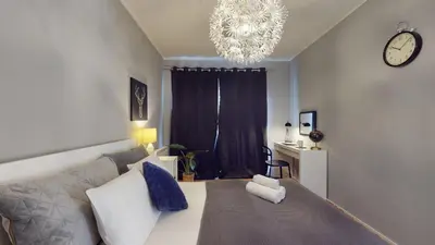 Łóżko lub łóżka w pokoju w obiekcie Kurkowa 14 Tectum Apartments