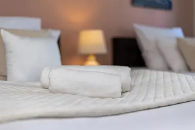 Łóżko lub łóżka w pokoju w obiekcie Hotel A4 Wrocław - Bielany