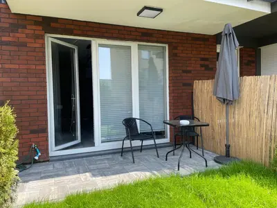Ogród w obiekcie Apartamet Poezji A04 Blue