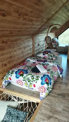 Łóżko lub łóżka w pokoju w obiekcie Pod Aniołem
