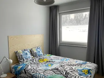 Łóżko lub łóżka w pokoju w obiekcie Apartamenty Spalona Sport