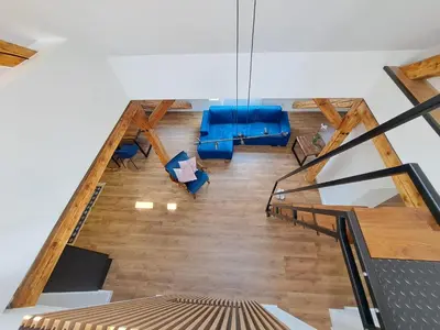 Łóżko lub łóżka w pokoju w obiekcie PIASTA STREET APARTMENT