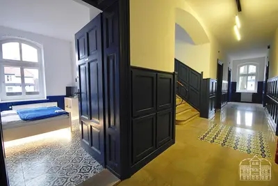 Łóżko lub łóżka w pokoju w obiekcie Pokoje Turystyczne przy Parku Szwedzkim