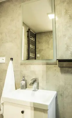 Łazienka w obiekcie Domki Nad Stawami z Jacuzzi i Sauną 1