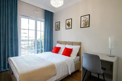 Łóżko lub łóżka w pokoju w obiekcie Apartament Bulwar Staromiejski Stare Miasto Centrum