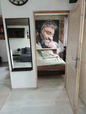 Łóżko lub łóżka w pokoju w obiekcie Górnicza Wrocław