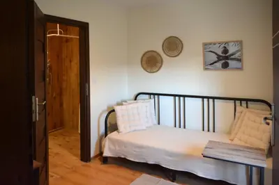 Łóżko lub łóżka w pokoju w obiekcie Winnica Anna Noclegi
