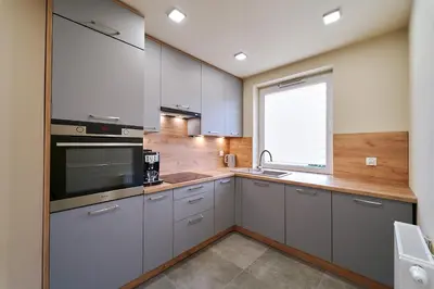 Kuchnia lub aneks kuchenny w obiekcie LAGUNA Villa Fonte 16 z garażem