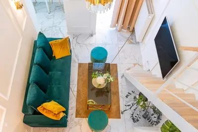 Część wypoczynkowa w obiekcie Apartament Chanel Jana Pawła