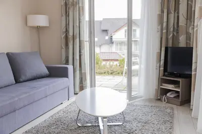 Telewizja i/lub zestaw kina domowego w obiekcie VacationClub - Bormio Apartament 5