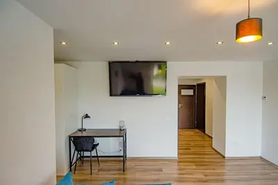 Telewizja i/lub zestaw kina domowego w obiekcie Apartamenty Żołnierska 31 - Apartament nr 2