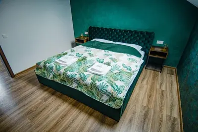 Łóżko lub łóżka w pokoju w obiekcie Apartamenty Żołnierska 31 - Apartament nr 2