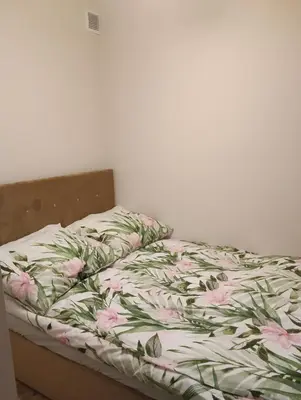 Łóżko lub łóżka w pokoju w obiekcie Apartament Osiedle Bajkowe