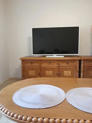 Telewizja i/lub zestaw kina domowego w obiekcie Apartament Osiedle Bajkowe