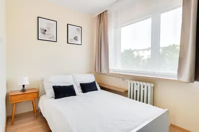 Łóżko lub łóżka w pokoju w obiekcie Apartament Słoneczny, PW INVEST HOME