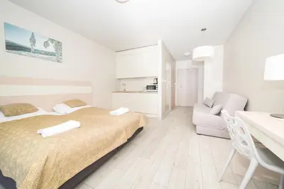 Łóżko lub łóżka w pokoju w obiekcie VacationClub - Ischgl Apartament 19