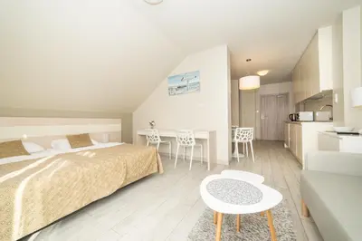 Łóżko lub łóżka w pokoju w obiekcie VacationClub - Ischgl Apartament 39